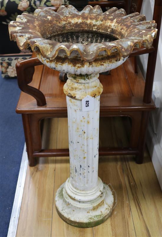 A Victorian cast iron urn and stand, H.76cm